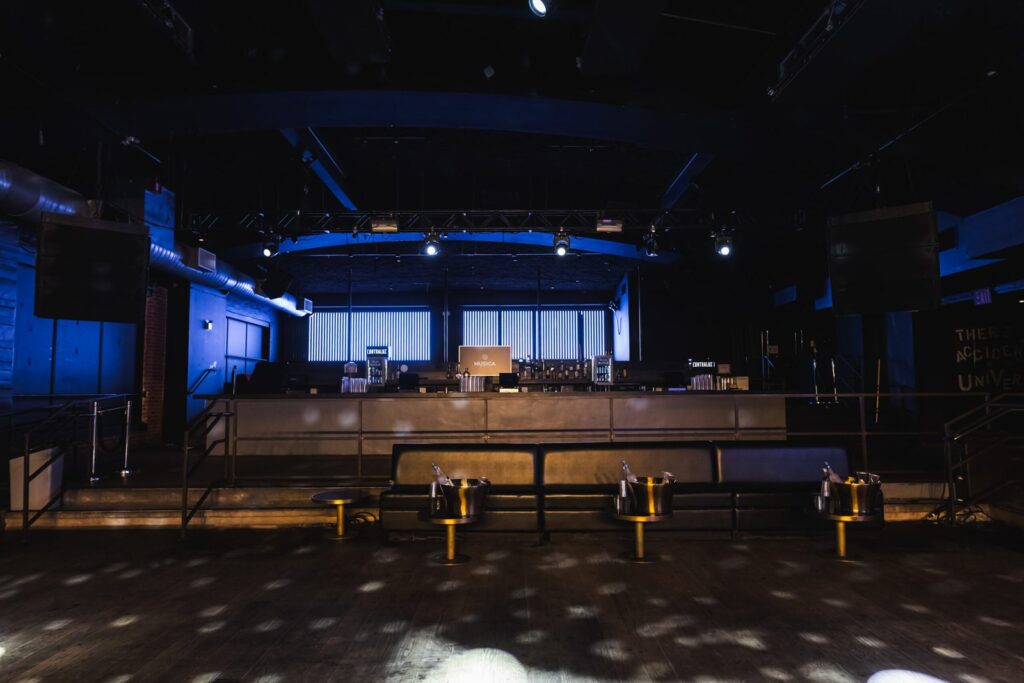 The Dean NYC party venue event hall with open floor, dynamic lighting and lounge seating