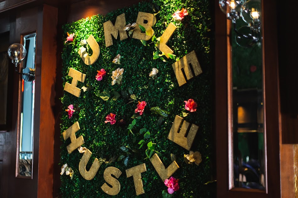 The Dean NYC interior lounge with ambient lighting, lounge seating and vibrant neon-accent walls in Midtown Manhattan